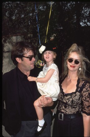 Dan Aykroyd, Donna Dixon and daughter  
Opening night party for Planet Hollywood
November 5, 1992 - Los Angeles,   CA.
Dan Aykroyd, Donna Dixon and daughter  .
Celebrity Flea Market AIDS Benefit   .
Photo ® Berliner Studio/BEImages