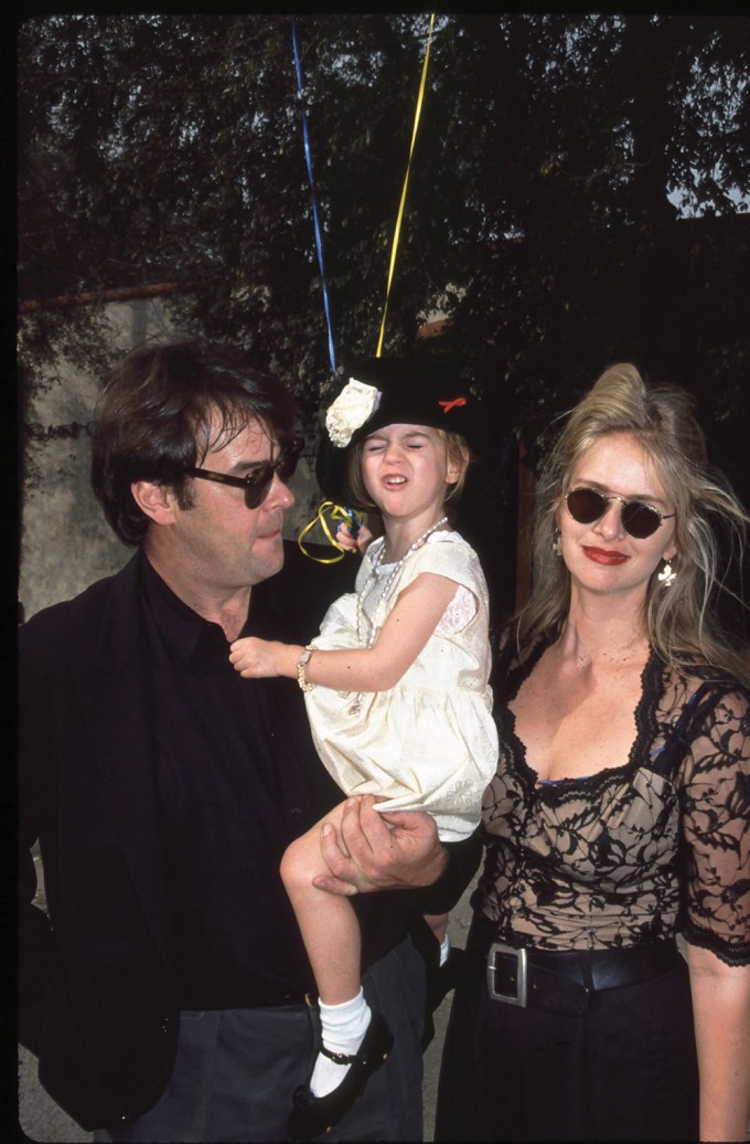 Dan Aykroyd and Donna Dixon with one of their daughters