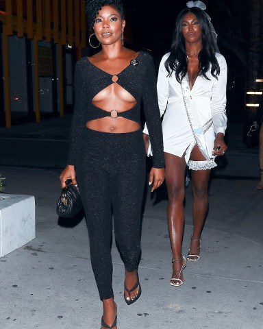 West Hollywood, CA  - Gabrielle Union arrives for a girls' night out at Catch Steak LA for a friend's bridal party. The seasoned actress made a risque fashion choice with a revealing midriff barring black sparkle body suit.  Pictured: Gabrielle Union  BACKGRID USA 24 JULY 2022   BYLINE MUST READ: TWIST / BACKGRID  USA: +1 310 798 9111 / usasales@backgrid.com  UK: +44 208 344 2007 / uksales@backgrid.com  *UK Clients - Pictures Containing Children Please Pixelate Face Prior To Publication*