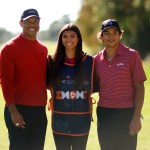 ORLANDO, FLORIDA - DECEMBER 22: Tiger Woods of the United States with his son Charlie Woods and daughter Sam Woods stand on the first tee during the second round of the PNC Championship at Ritz-Carlton Golf Club on December 22, 2024 in Orlando, Florida. (Photo by Mike Ehrmann/Getty Images)