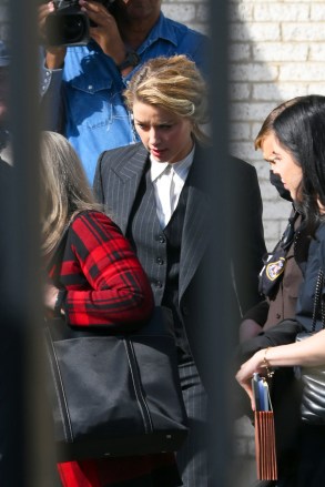 Amber Heard leaving Courthouse in Virginia where she And Ex-Johnny Depp are to Face Off in Defamation Trial Pictured: Amber Heard Ref: SPL5303065 110422 NON-EXCLUSIVE Picture by: Elder Ordonez / SplashNews.com Splash News and Pictures USA: +1 310- 525-5808 London: +44 (0)20 8126 1009 Berlin: +49 175 3764 166 photodesk@splashnews.com World Rights, No Poland Rights, No Portugal Rights, No Russia Rights
