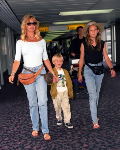 Goldie Hawn with son Wyatt Russell and daughter Kate Hudson
Goldie Hawn with Family at Heathrow Airport, London, Britain - 1991