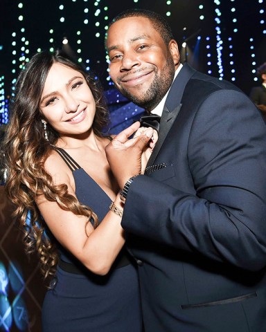 Christina Evangeline, Kenan Thompson. Christina Evangeline, left, and Kenan Thompson attend the Governors Ball during night two of the Television Academy's 2018 Creative Arts Emmy Awards at the Microsoft Theater, in Los Angeles
2018 Creative Arts Emmy Awards - Governors Ball - Night Two, Los Angeles, USA - 09 Sep 2018