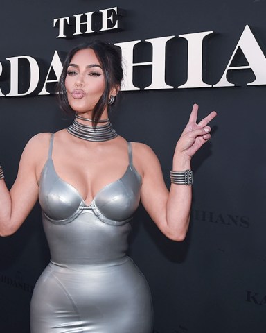 FOR EDITORIAL USE ONLYMandatory Credit: Photo by Action Press/Shutterstock (12886785h)In this handout photo provided by Hulu, The Walt Disney Company, Kim Kardashian wearing a custom Thierry Mugler latex dress that was designed exclusively by Thierry before he passed away arrives at the Los Angeles Premiere of Hulu's The Kardashians Held at Goya Studios on April 7, 2022 in Hollywood, Los Angeles, California, United States'The Kardashians' TV Show premiere, Los Angeles, Califrnia, USA - 07 Apr 2022
