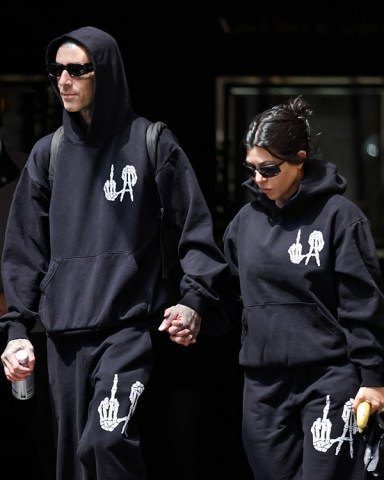 Kourtney Kardashian and Travis Barker leave their hotel on April 28, 2022 in Milan, Italy Kourtney Kardashian And Travis Barker Celebrity Sightings In Milan, Italy - 28 Apr 2022