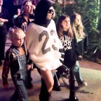 *EXCLUSIVE* Kourtney Kardashian and Kids Join the Coachella Crowd to Cheer on Husband Travis Barker's Explosive Performance!