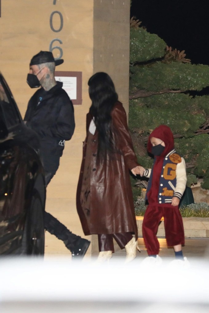 Kourtney Kardashian & Travis Barker Leave Nobu With The Kids