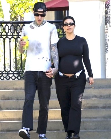 Los Angeles, CA  - *EXCLUSIVE*  - Kourtney Kardashian confidently shows off her baby bump while holding hands with Travis Barker as they go for a coffee run near their Calabasas home. Travis exudes a cool vibe, while Kourtney rocks a stylish all-black outfit and completes her look with sunglasses.Pictured: Kourtney Kardashian,Travis BarkerBACKGRID USA 20 JULY 2023 USA: +1 310 798 9111 / usasales@backgrid.comUK: +44 208 344 2007 / uksales@backgrid.com*UK Clients - Pictures Containing ChildrenPlease Pixelate Face Prior To Publication*