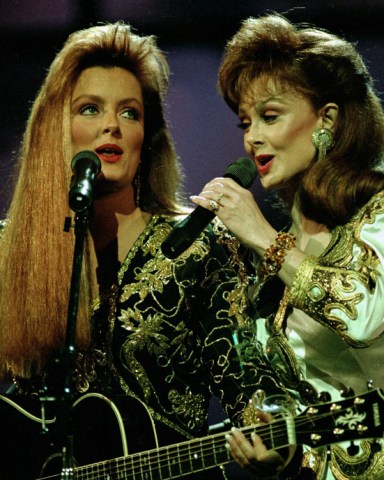 Judd Wynonna Judd, left, and her mother, Naomi, perform during the Country Music Association awards show in Nashville, Tenn., . The Judds took home the award for duo of the year
WYNONNA NAOMI JUDD