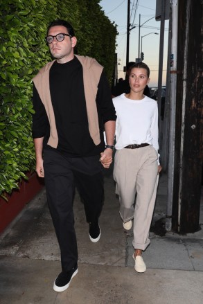 Santa Monica, CA  - *EXCLUSIVE*  -    Engaged couple Sofia Richie and Elliot Grainge hold hands as they arrive at Giorgio Baldi restaurant to have dinner with sister Nicole Richie and her husband Joel Madden in Santa Monica.

Sofie Richie and Fiancé Elliot Grainge arrived at 8 pm in their Tesla. Nicole and Joel Madden arrived separately in their Black Land Rover Defender around 8:45 pm. They dinned until 10:45 pm. They all walked out together. Joel was camera shy but Sofie and Elliot where hand and hand while exiting. 
Nicole and Sofia where both dressed in casual wear while the Elliot and Joel where in matching black attire.

Pictured: Sofia Richie, Elliot Grainge

BACKGRID USA 30 JUNE 2022 

USA: +1 310 798 9111 / usasales@backgrid.com

UK: +44 208 344 2007 / uksales@backgrid.com

*UK Clients - Pictures Containing Children
Please Pixelate Face Prior To Publication*