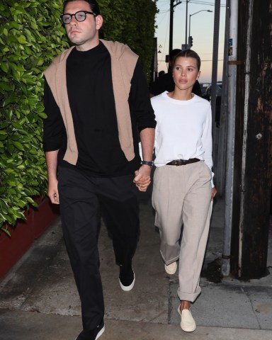 Santa Monica, CA  - *EXCLUSIVE*  -    Engaged couple Sofia Richie and Elliot Grainge hold hands as they arrive at Giorgio Baldi restaurant to have dinner with sister Nicole Richie and her husband Joel Madden in Santa Monica.Sofie Richie and Fiancé Elliot Grainge arrived at 8 pm in their Tesla. Nicole and Joel Madden arrived separately in their Black Land Rover Defender around 8:45 pm. They dinned until 10:45 pm. They all walked out together. Joel was camera shy but Sofie and Elliot where hand and hand while exiting. Nicole and Sofia where both dressed in casual wear while the Elliot and Joel where in matching black attire.Pictured: Sofia Richie, Elliot GraingeBACKGRID USA 30 JUNE 2022 USA: +1 310 798 9111 / usasales@backgrid.comUK: +44 208 344 2007 / uksales@backgrid.com*UK Clients - Pictures Containing ChildrenPlease Pixelate Face Prior To Publication*