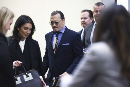 Actor Johnny Depp arrives in courtroom at the Fairfax County Circuit Court in Fairfax, Va.,.  Actor Johnny Depp sued his ex-wife actor Amber Heard for libel in Fairfax County Circuit Court after she wrote an op-ed piece in The Washington Post in 2018 referring to herself as a "public figure representing domestic abuse Depp Heard Lawsuit, Fairfax, United States - 05 May 2022