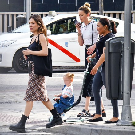 EXCLUSIVE: Amber Heard seen out in Madrid with her daughter after starting a new life in the Spanish capital after her messy divorce from Johnny Depp. Amber was seen settling into life in Madrid after the legal case with ex husband Johnny Depp. Heard has just been announced to be reprising her role in the Aquaman film franchise. 28 Apr 2023 Pictured: Amber Heard. Photo credit: MEGA TheMegaAgency.com +1 888 505 6342 (Mega Agency TagID: MEGA976954_012.jpg) [Photo via Mega Agency]