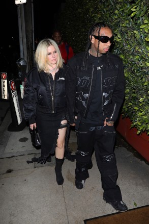 Santa Monica, CA  - *EXCLUSIVE*  - Avril Lavigne, 38, and rapper boyfriend Tyga, 33, confirm dating rumors as they are seen lovingly holding hands as they are seen heading to Italian restaurant Giorgio Baldi for a romantic dinner date in Santa Monica.Pictured: Avril Lavigne, TygaBACKGRID USA 9 MARCH 2023 BYLINE MUST READ: TPG / BACKGRIDUSA: +1 310 798 9111 / usasales@backgrid.comUK: +44 208 344 2007 / uksales@backgrid.com*UK Clients - Pictures Containing ChildrenPlease Pixelate Face Prior To Publication*