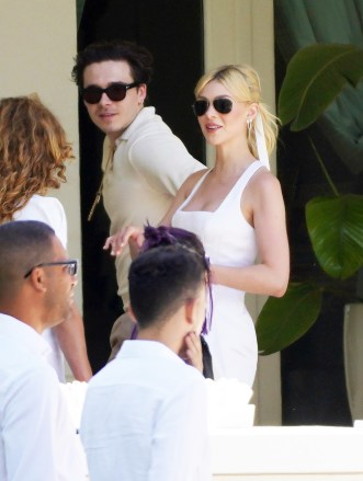Newlyweds Brooklyn and Nicola Peltz look radiant as they step out for brunch on Sunday the day after their flashy Palm Beach nuptials.   Husband and wife were seen at the Peltz familys stunning Florida pad on day three of the star-studded wedding extravaganza.   The bride wore a white dress and matching ribbon in her flowing blonde ponytail while Brooklyn looked dapper in cream knitted shirt.  Their romantic outing came as a lavish brunch was being held at a huge marquee set up in sprawling tropical gardens out back of the Peltz residence.  David and Victorias eldest son and actress Nicola tied the knot at her ultra wealthy familys USD 76 million oceanfront estate.  Pictured: Brooklyn Beckham,Nicola Peltz Ref: SPL5302812 100422 NON-EXCLUSIVE Picture by: RM / SplashNews.com  Splash News and Pictures USA: +1 310-525-5808 London: +44 (0)20 8126 1009 Berlin: +49 175 3764 166 photodesk@splashnews.com  World Rights