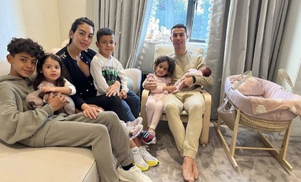 Manchester United star Cristiano Ronaldo shared a social media update on Thursday April 21, 2022 shortly after their baby girl made the journey back from hospital following her birth on Monday April 18, 2022. However a statement released on Monday confirmed one of the couple's twins had died, with Ronaldo describing the loss as 'the greatest pain'. Ronaldo, 37, cradled his daughter while accompanied by Spanish partner Georgina and their four children - three of which the footballer fathered through surrogates.
Cristiano Ronaldo shares Family photo with New Born Baby Girl, Manchester, UK - 21 Apr 2022