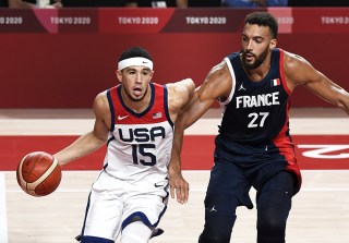 United States' Devin Booker (15) drives under the basket as he is defended by France's Rudy Gobert in Men's Basketball final at the Tokyo 2020 Olympics, Saturday, August 7, 2021, in Tokyo, Japan. USA defeated France, winning the Gold Medal, 87-82.
Tokyo Olympics, Japan - 07 Aug 2021