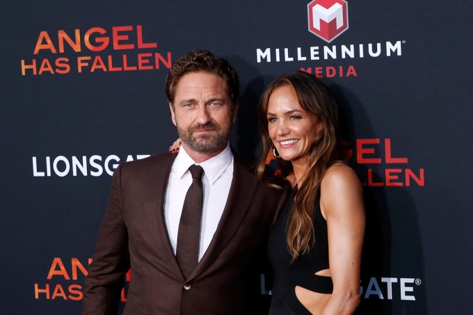 Gerard Butler and Morgan Brown on a red carpet