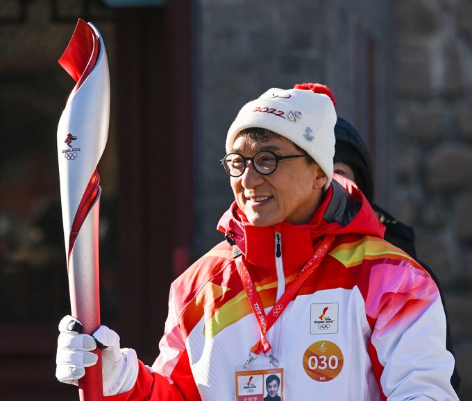 Jackie Chan Carries The Olympic Torch