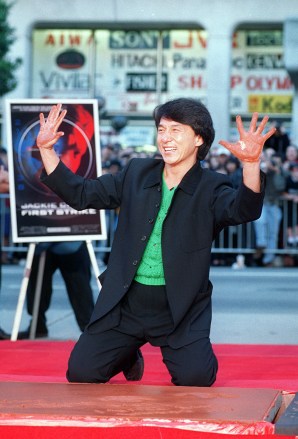 JACKIE CHAN Action star Jackie Chan shows off his wet hands after immortalizing them in cement outside Mann's Chinese Theatre in the Hollywood section of Los Angeles . Chan, who stars in the soon-to-be-released feature "Jackie Chan's First Strike," will receive the Media Action Network for Asian Americans Positive Image Award for his portrayals of Asians on the silver screen
PEOPLE CHAN, LOS ANGELES, USA