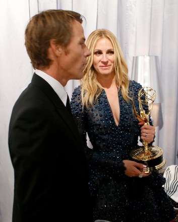 Danny Moder, left, and Julia Roberts backstage in the green room at the 66th Primetime Emmy Awards at the Nokia Theatre L.A. Live, in Los Angeles
66th Primetime Emmy Awards - Green Room, Los Angeles, USA - 25 Aug 2014