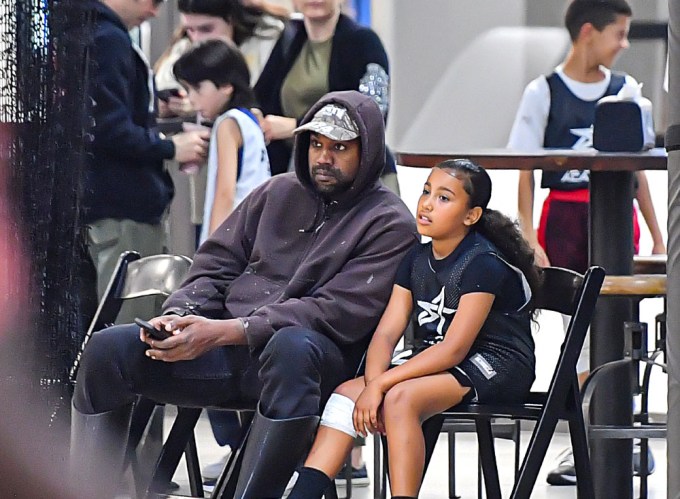 Kanye & North at her basketball game