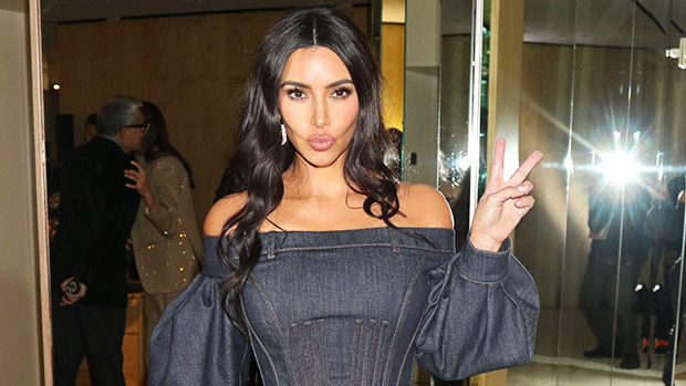 Kim Kardashian Slays In Tube Top & Completely Cut Up Jeans In Sexy New Photos