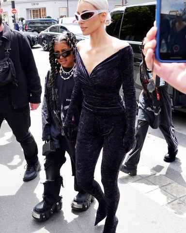 **USE CHILD PIXELATED IMAGES IF YOUR TERRITORY REQUIRES IT**Kim Kardashian and her daughter North seen during Paris Fashion Week on July 6, 2022 in Paris, France. Photo by ABACAPRESS.COMPictured: Kim Kardashian,North WestRef: SPL5324306 060722 NON-EXCLUSIVEPicture by: AbacaPress / SplashNews.comSplash News and PicturesUSA: +1 310-525-5808London: +44 (0)20 8126 1009Berlin: +49 175 3764 166photodesk@splashnews.comUnited Arab Emirates Rights, Australia Rights, Bahrain Rights, Canada Rights, Greece Rights, India Rights, Israel Rights, South Korea Rights, New Zealand Rights, Qatar Rights, Saudi Arabia Rights, Singapore Rights, Thailand Rights, Taiwan Rights, United Kingdom Rights, United States of America Rights