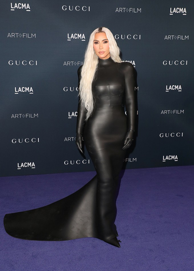 Kim In a black leather dress