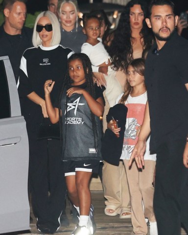 Malibu, CA  - *EXCLUSIVE*  - Kim Kardashian and kids enjoy dinner at Nobu with friends after attending North Wests basketball game  Pictured: Kim Kardashian, North West, Saint West, Penelope Disick, Olivia Pierson  BACKGRID USA 22 JULY 2022   USA: +1 310 798 9111 / usasales@backgrid.com  UK: +44 208 344 2007 / uksales@backgrid.com  *UK Clients - Pictures Containing Children Please Pixelate Face Prior To Publication*