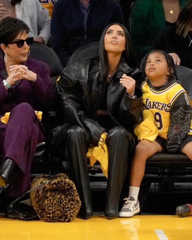 **USE CHILD PIXELATED IMAGES IF YOUR TERRITORY REQUIRES IT**Kim Kardashian and Saint West at the Los Angeles Lakers VS Memphis Grizzlies game at Crypto.com Arena in Los Angeles, CaPictured: Kris Jenner,Kim Kardashian,Saint WestRef: SPL5539971 240423 NON-EXCLUSIVEPicture by: London Entertainment / SplashNews.comSplash News and PicturesUSA: +1 310-525-5808London: +44 (0)20 8126 1009Berlin: +49 175 3764 166photodesk@splashnews.comWorld Rights