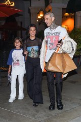 Calabasas, CA  - *EXCLUSIVE*  - Travis Barker is a happy man leaving his new restaurant Crossroads Kitchen opening with his wife, Kourtney Kardashian, and her daughter Penelope Disick.

Pictured: Travis Barker, Kourtney Kardashian

BACKGRID USA 13 OCTOBER 2022 

USA: +1 310 798 9111 / usasales@backgrid.com

UK: +44 208 344 2007 / uksales@backgrid.com

*UK Clients - Pictures Containing Children
Please Pixelate Face Prior To Publication*