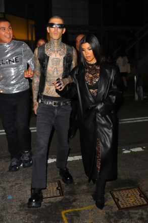 New York City, NY - Kourtney Kardashian and Travis Barker leave her NYFW show at the Highline in New York City.  Pictured: Kourtney Kardashian, Travis Barker BACKGRID USA 13 SEPTEMBER 2022 BYLINE MUST READ: BlayzenPhotos / BACKGRID USA: +1 310 798 9111 / usasales@backgrid.com UK: +44 208 344 2007 / uksales@backgrid.com *UK Clients - Pictures Containing Children Please Pixelate Face Prior To Publication*