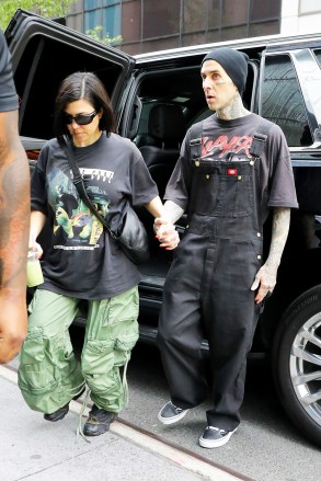 Kourtney Kardashian and Travis Barker hold hands as arriving back at the New York CIty HotelPictured: Kourtney Kardashian and Travis BarkerRef: SPL7034744 190523 NON-EXCLUSIVEPicture by: Felipe Ramales / SplashNews.comSplash News and PicturesUSA: 310-525-5808UK: 020 8126 1009eamteam@shutterstock.comWorld Rights