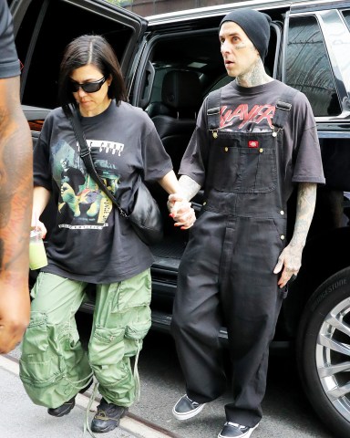 Kourtney Kardashian and Travis Barker hold hands as arriving back at the New York CIty HotelPictured: Kourtney Kardashian and Travis BarkerRef: SPL7034744 190523 NON-EXCLUSIVEPicture by: Felipe Ramales / SplashNews.comSplash News and PicturesUSA: 310-525-5808UK: 020 8126 1009eamteam@shutterstock.comWorld Rights