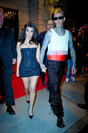 New York, NY  - Kourtney Kardashian stuns while heading to a Met Gala afterparty with Travis Barker in New York.  Pictured: Kourtney Kardashian, Travis Barker  BACKGRID USA 2 MAY 2022   BYLINE MUST READ: JosiahW / BACKGRID  USA: +1 310 798 9111 / usasales@backgrid.com  UK: +44 208 344 2007 / uksales@backgrid.com  *UK Clients - Pictures Containing Children Please Pixelate Face Prior To Publication*