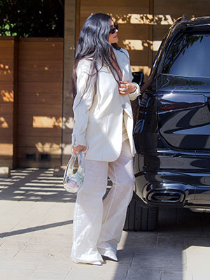 Kylie Jenner Carries Lipstick Clutch Out in Beverly Hills
