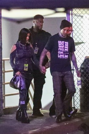 Los Angeles, CA - *EXCLUSIVE* - Travis Barker is joined by wife Kourtney Kardashian Barker and daughter Atiana De La Hoya at the Foo Fighter & The Hawkins Family Present Taylor Hawkins Tribute Concert after he performed with Joan Jett.Pictured: Kourtney Kardashian, Travis BarkerBACKGRID USA 27 SEPTEMBER 2022 USA: +1 310 798 9111 / usasales@backgrid.comUK: +44 208 344 2007 / uksales@backgrid.com*UK Clients - Pictures Containing ChildrenPlease Pixelate Face Prior To Publication*