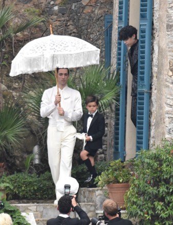 *EXCLUSIVE* portofino, ITALY - Here Comes the Bride!! Kourtney Kardashian is seen being guided to her wedding by mother Kris.Pictured: ring boy BACKGRID USA 22 MAY 2022 BYLINE MUST READ: Cobra Team / BACKGRIDUSA: +1 310 798 9111 / usasales@backgrid.comUK: +44 208 344 2007 / uksales@backgrid.com*UK Clients - Pictures Containing ChildrenPlease Pixelate Face Prior To Publication*