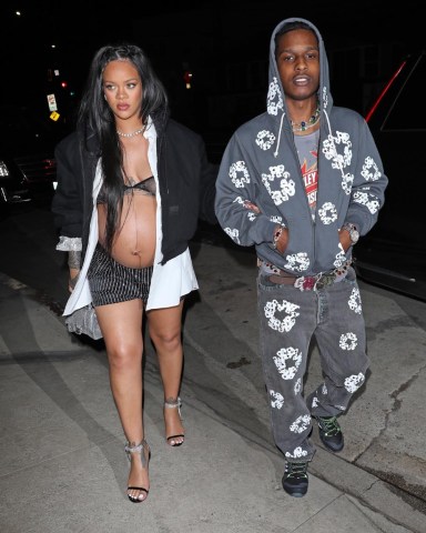 Santa Monica, CA  - A pregnant Rihanna and ASAP Rocky hold hands as they head to Giorgio Baldi restaurant for her baby shower dinner with family and friends in Santa Monica.  Pictured: Rihanna, ASAP Rocky  BACKGRID USA 24 APRIL 2022   USA: +1 310 798 9111 / usasales@backgrid.com  UK: +44 208 344 2007 / uksales@backgrid.com  *UK Clients - Pictures Containing Children Please Pixelate Face Prior To Publication*