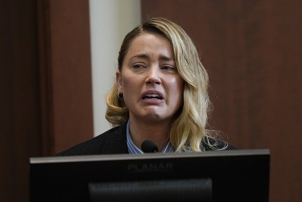 Actress Amber Heard testifies about the first time her ex-husband, actor Johnny Depp hit her, during the Depp v Heard defamation case at Fairfax County Circuit Court, in Fairfax, Virginia, USA, 04 May 2022. US actor Johnny Depp sued his ex -wife US actress Amber Heard for libel in Fairfax County Circuit Court after she wrote an op-ed piece in The Washington Post in 2018 referring to herself as a 'public figure representing domestic abuse.'  Depp v Heard defamation lawsuit at County Circuit Court in Fairfax, USA - 04 May 2022