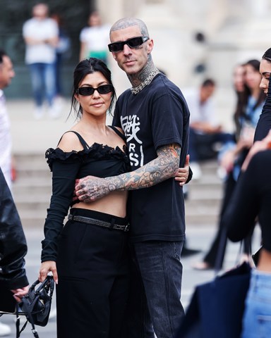 Kourtney Kardashian and Travis Barker are seen at Piazza Duomo on May 25, 2022 in Milan, Italy with Alabama Barker and Atiana De La Hoya. Kourtney Kardashian And Travis Barker Celebrity Sightings In Milan, Italy - 25 May 2022