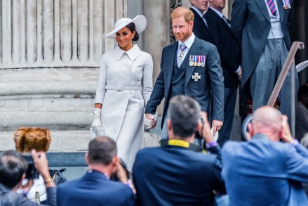 Prince Harry and Meghan, Duke and Meghan Duchess of Sussex, leave - The service of Thanksgiving at St Pauls Cathedral as part of celebrations for the Platinum Jubilee of HM The Queen Elizabeth.
The service at St Pauls Cathedral as part of celebrations for the Platinum Jubilee of HM The Queen Elizabeth., St Pauls Cathedral, London, UK - 03 Jun 2022