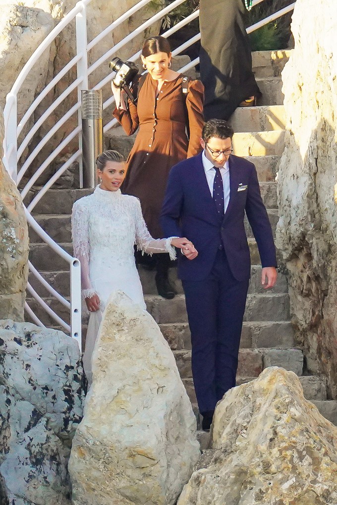 Sofia Richie & Elliot Grainge walking down the stairs