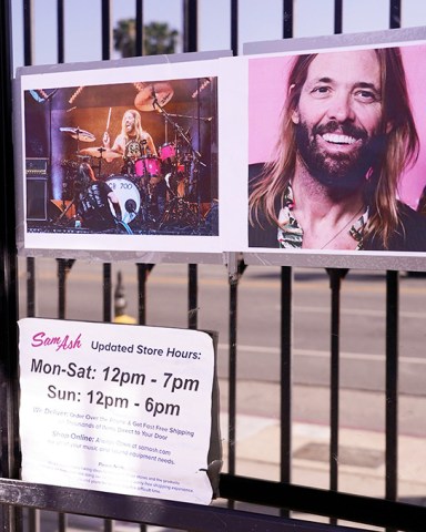Pictures of the late Foo Fighters drummer Taylor Hawkins adorn the front entrance to Sam Ash Drum Shop, in Los Angeles. Hawkins died suddenly last Friday while on tour with the Foo Fighters in Bogota, Colombia
Music Taylor Hawkins, Los Angeles, United States - 30 Mar 2022