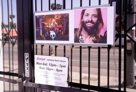 Photographs of the late Foo Fighters drummer Taylor Hawkins adorn the front entrance of the Sam Ash Drum Shop in Los Angeles.  Hawkins died suddenly last Friday while on tour with the Foo Fighters in Bogota, Colombia Music Taylor Hawkins, Los Angeles, USA - March 30, 2022