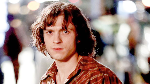 Tom Holland Looks Different Than Peter Parker With Longer ’70s-Inspired Hair & Clothes In NYC