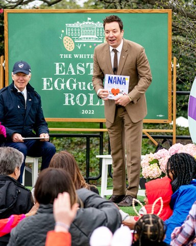 President Joe Biden and first lady Jill Biden listen as entertainer and The Tonight Show Host Jimmy Fallon reads his book "Nana" during the White House Easter Egg Roll at the White House, in Washington
Biden Egg Roll, Washington, United States - 18 Apr 2022