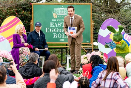 President Joe Biden and first lady Jill Biden listen as entertainer and The Tonight Show Host Jimmy Fallon reads his book "Nana" during the White House Easter Egg Roll at the White House, in Washington
Biden Egg Roll, Washington, United States - 18 Apr 2022