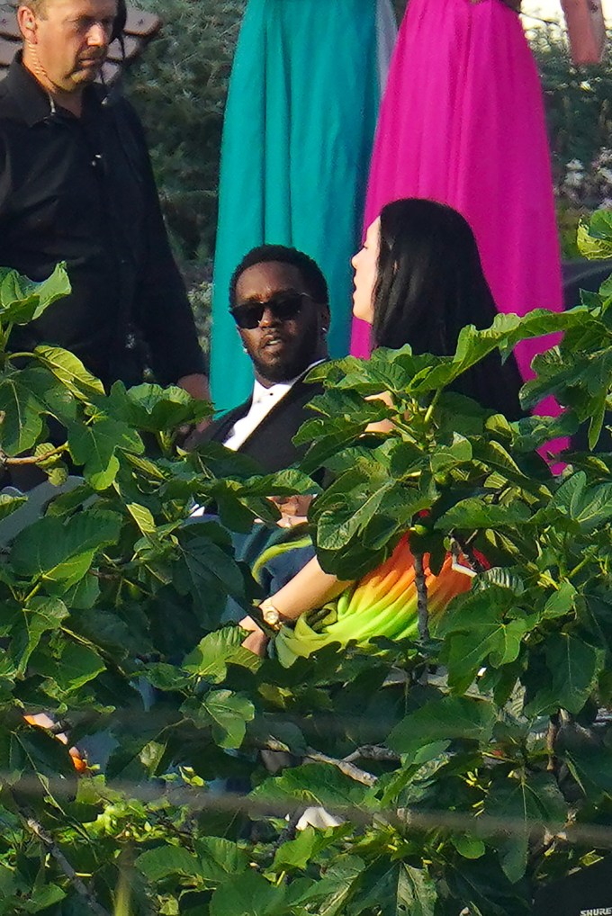 Diddy sitting at the wedding